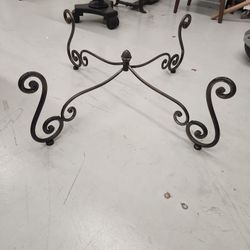 wrought iron or oval glass table top