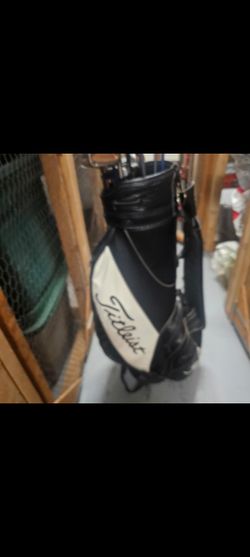 Golf Bag with drivers and putters 