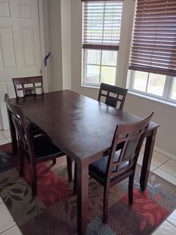 Table and four chairs