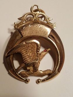 1903 gold pendant with real Bald Eagle claws red ruby eyes