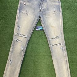 Ksubi blue shredded jeans