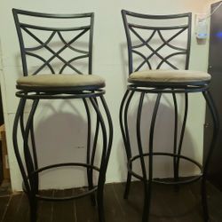 Two Cast Iron Stools