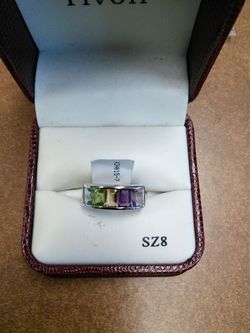 Nice ring multi colors i dont sz of ring .925