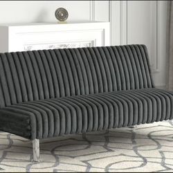 Futon.  Converts To Bed. 