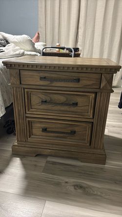 2 wood night stands with outlets