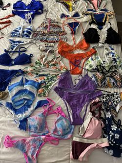 July 4th Super Mega Sale — 50 swimsuits at $3 each.