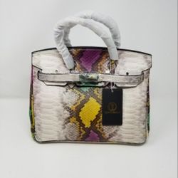 100% Genuine leather handbag from cow leather emboss in a snake skin texture design.