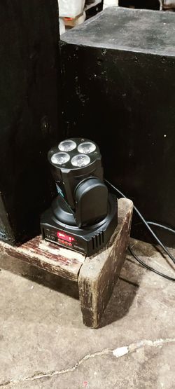 Professional stage lighting got motorized moving head dances to the music brand new $60 that's the lowest
