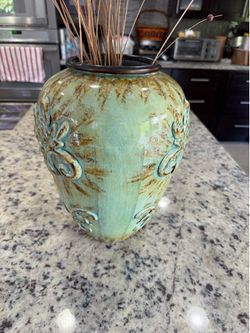 Distressed teal ceramic vase