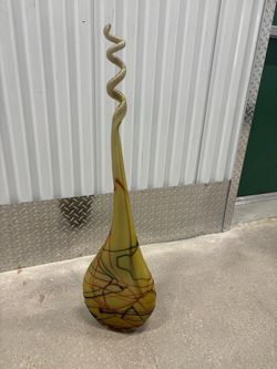 Random trails Glass solid vase … 36” high x 10” wide . $60