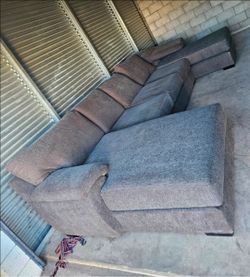 Ballinasloe charcoal Double chaise sectional, in nice clean condition

167 long by 76 wide on each side and 22 tall
