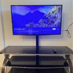 ENTERTAINMENT CENTER WITH LG TV