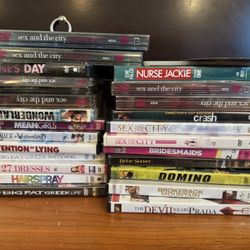 2 DVD Players And Many New Movies