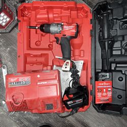 Milwaukee Hammer Drill, XC 5.0 Battery, And Super Charger 