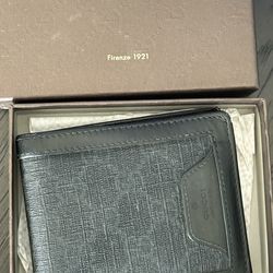 Gucc wallet.  Used but authentic.  Has some damage on the bottom.   $130
