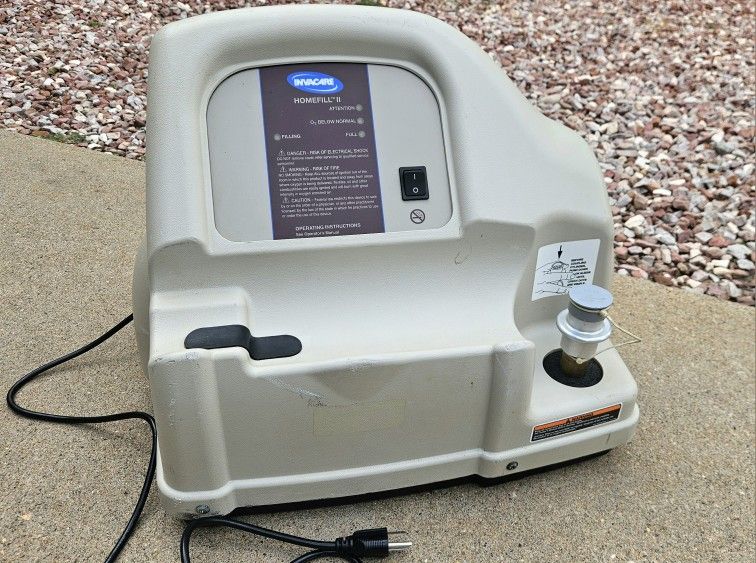 Invacare O2 Homefill II Compressor System oxgen refiller canisters tank. Refill oxygen canisters at home with your concentrator. This way you have po