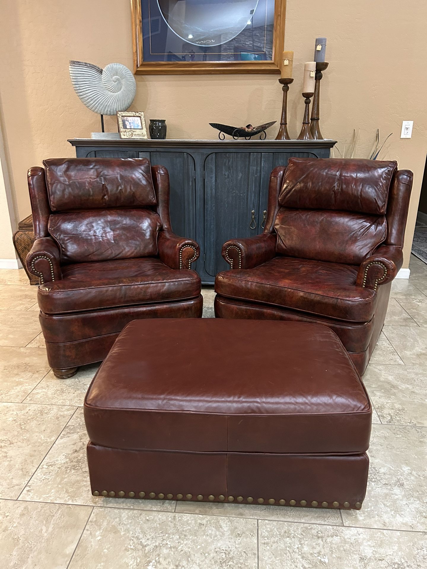 2 Leather Chairs, And Ottoman