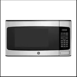 1.1 Cu. Ft. Capacity Countertop Microwave Oven brand new
