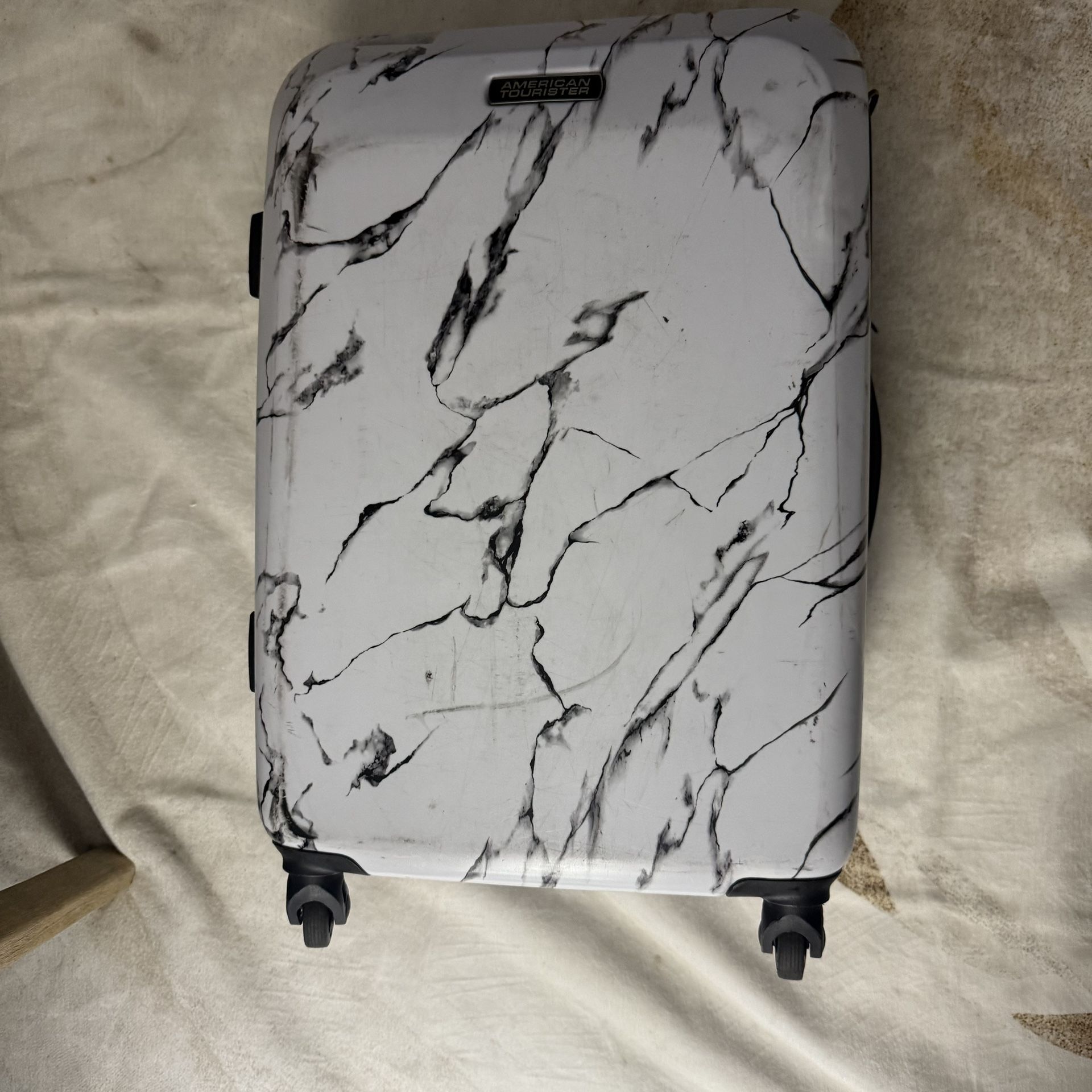 American Tourister Marble Suitcase
