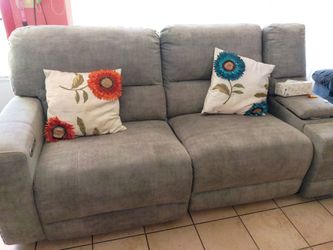 Sectional couch with electric recliner