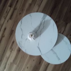 Marble Tile And Gold Colored Legs