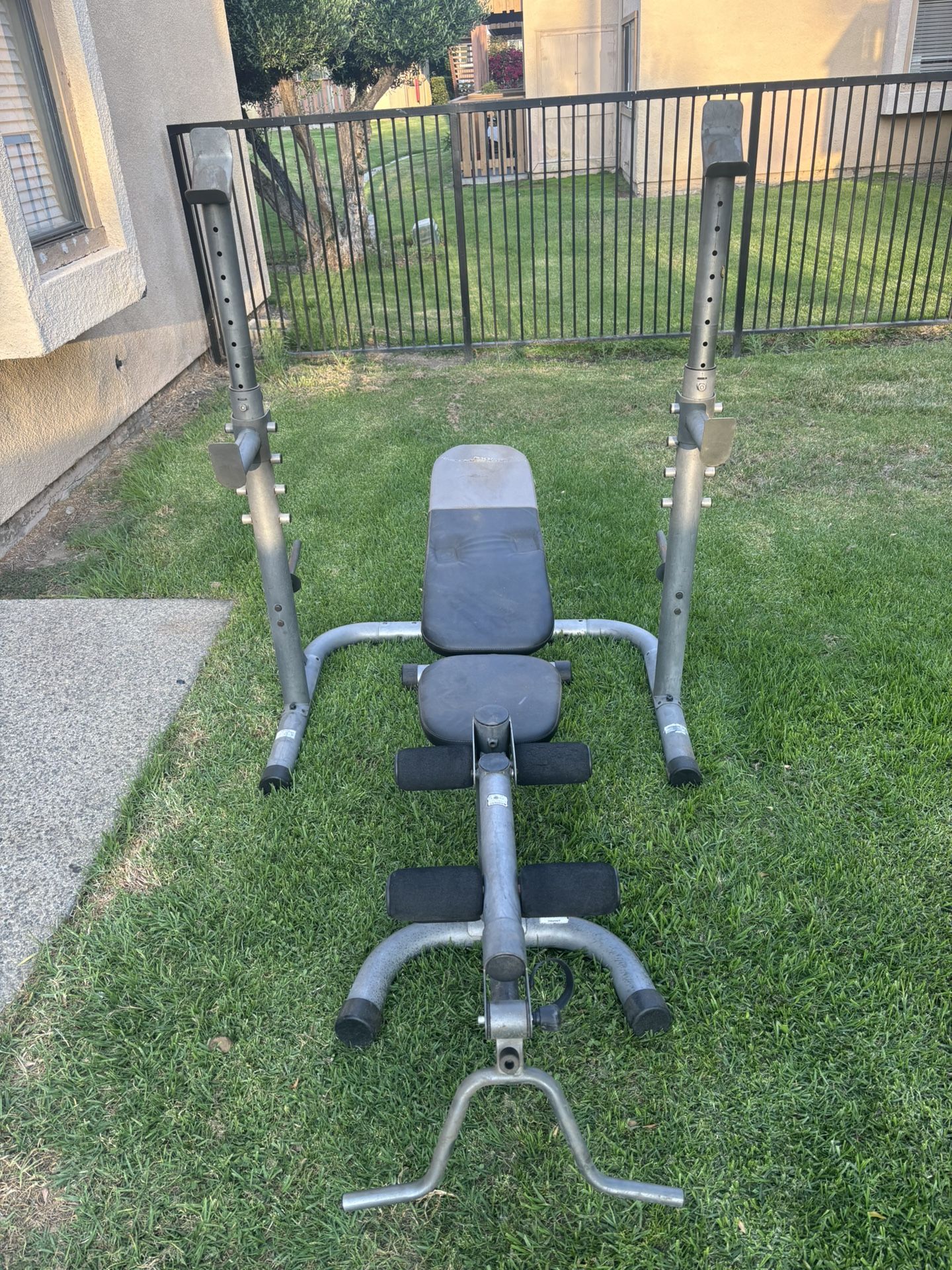 Weider Squat Rack / Bench Press With 2 Weights Storage Pegs Pegs, Curls Bar Handle And Leg Developer With 300 Lb Weight Set $250 If Purchased Together