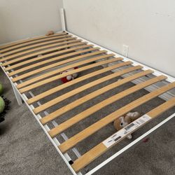 TWO kids bed frames WITH wood panels