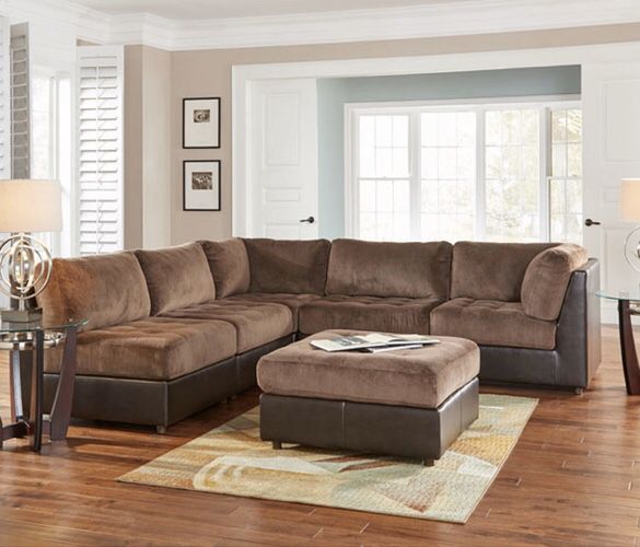 EXCELLENT condition sectional and ottoman for sale!