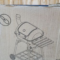 New Barrel briquette bbq. grill,Open box