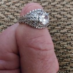 STERLING SILVER CZ RING.  SIZE 7.5. NEW. PICKUP ONLY