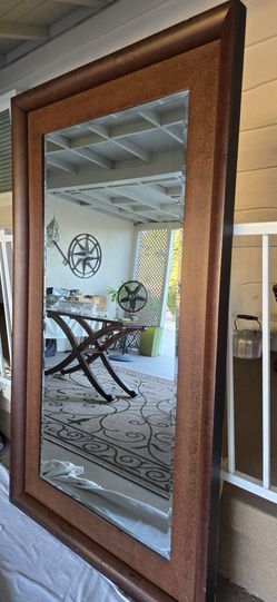 Large brown heavy floor mirror