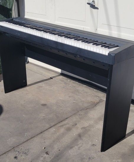 Yamaha Piano With Stand $120