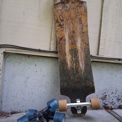 Longboard And Exra Pair Of Trucks With Wheels