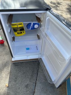 Brand new gray mini refrigerator for $90
