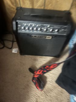Two Working Guitars And Line Six Amp