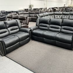 New Reclining Couch  / Love Seat .  Black Leather .  Free Delivery !