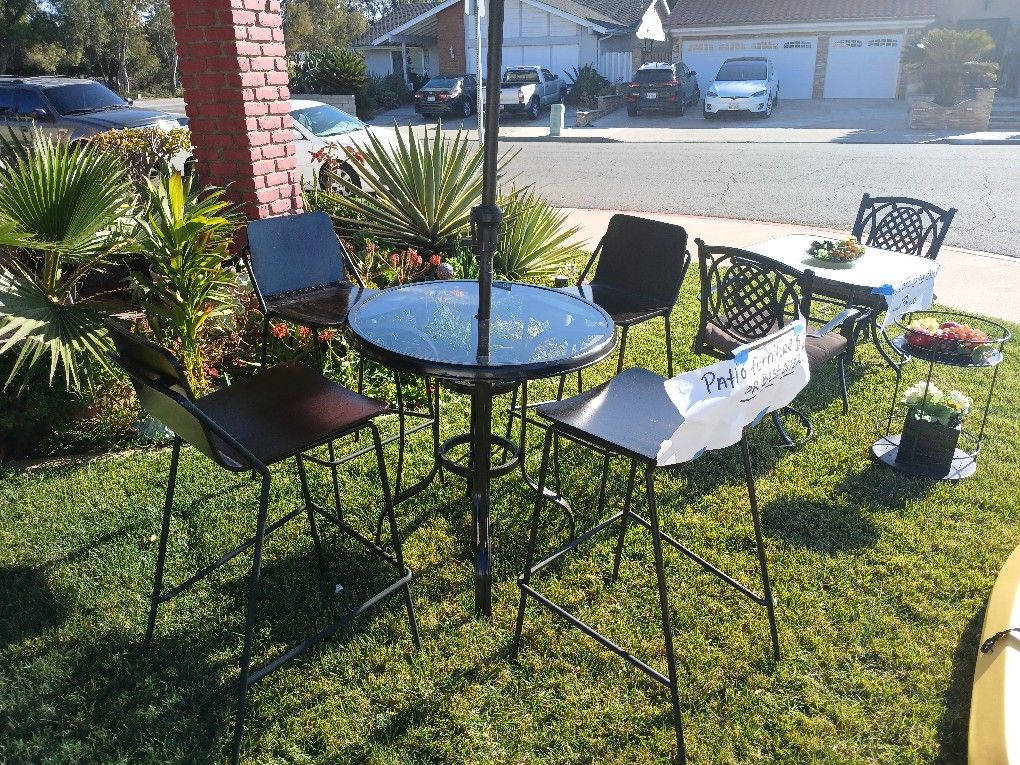 Patio Furniture And A Surfing Kayak