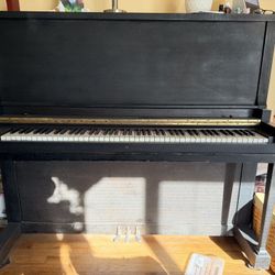 FREE upright Howard Piano