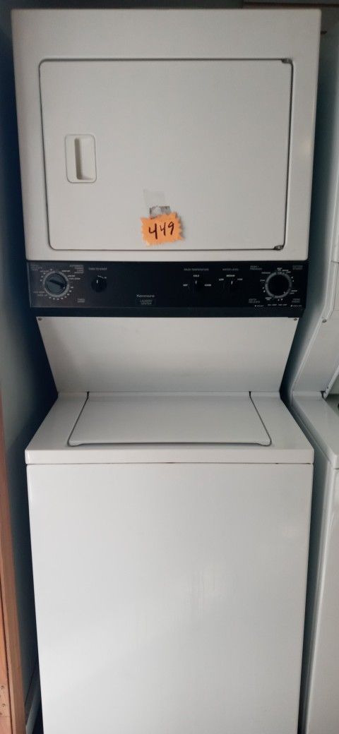 KENMORE STACKABLE CENTER WASHER AND DRYER WORK GREAT INCLUDING WARRANTY DELIVERY AVAILABLE