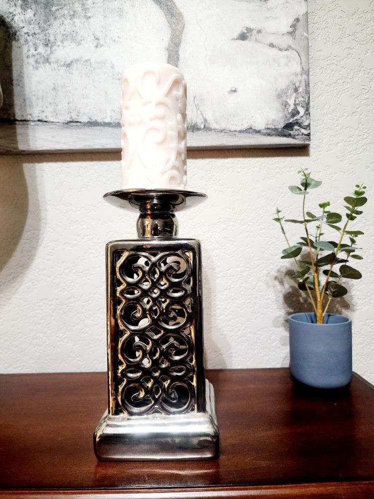 Silver ceramic candlestick holder. 