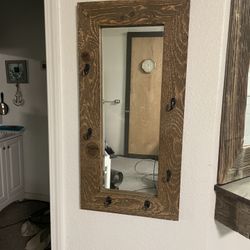 Hallway mirror with hooks