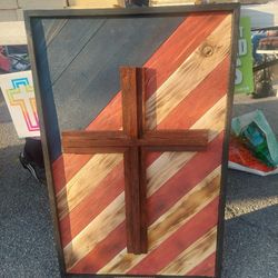 Handcrafted Wooden Cross On American Flag Backdrop