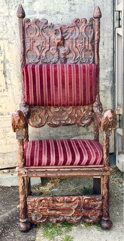 Late 19th Century Renaissance Revival Throne Chair, walnut, heavily carved with lions, foliate and grapevine decoration, upholstered seat and back, ci