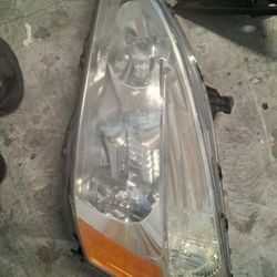 2015 nissan rogue left front headlight