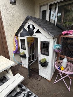 Kids play house and small picnic table