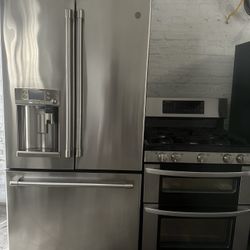 GE Cafe french door refrigerator &. LG double oven gas range set stainless steel 