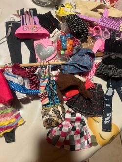 Barbie clothes and shoes with hangers