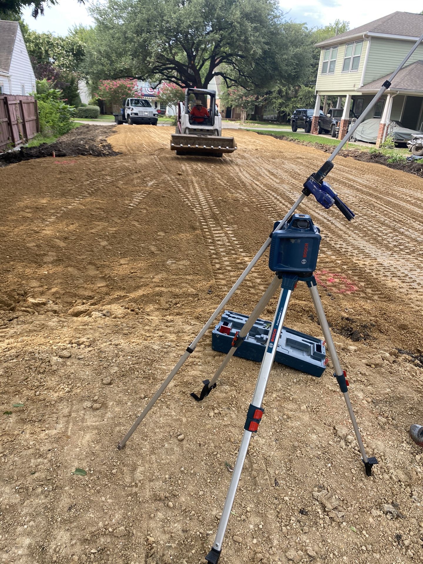 Skid steer work grading excavation dirt work