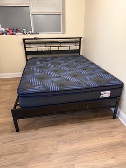 Like-New Black Metal Bed Frame with Headboard