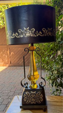 Lamp with amber center and dark features